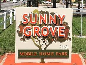 Sunny Grove Mobile Home Park Logo