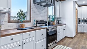 Lot #14 The Arabella / Raised 7/12 Roof Pitch - Sales Price: $214,995  OPTION: Standard Roof Pitch: $189,995 Interior 88274