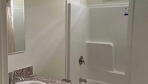Gorgeous Brand New 3 Bedroom + Den and 2 Bathroom Home! / 1 Northwood Village Bathroom 26595