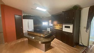 Whispering Pines Manufactured Home Community / 1723 Conifer Ave Kitchen 33335
