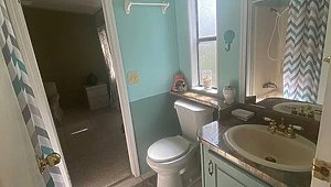 Whispering Pines Manufactured Home Community / 1723 Conifer Ave Bathroom 33367