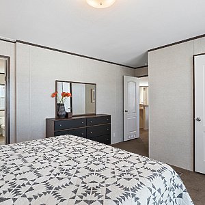 New Moon Doublewides / The Texan NM2856D Bedroom 33118