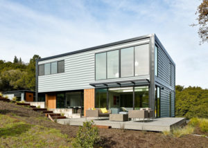 Exterior photo of a green modular home