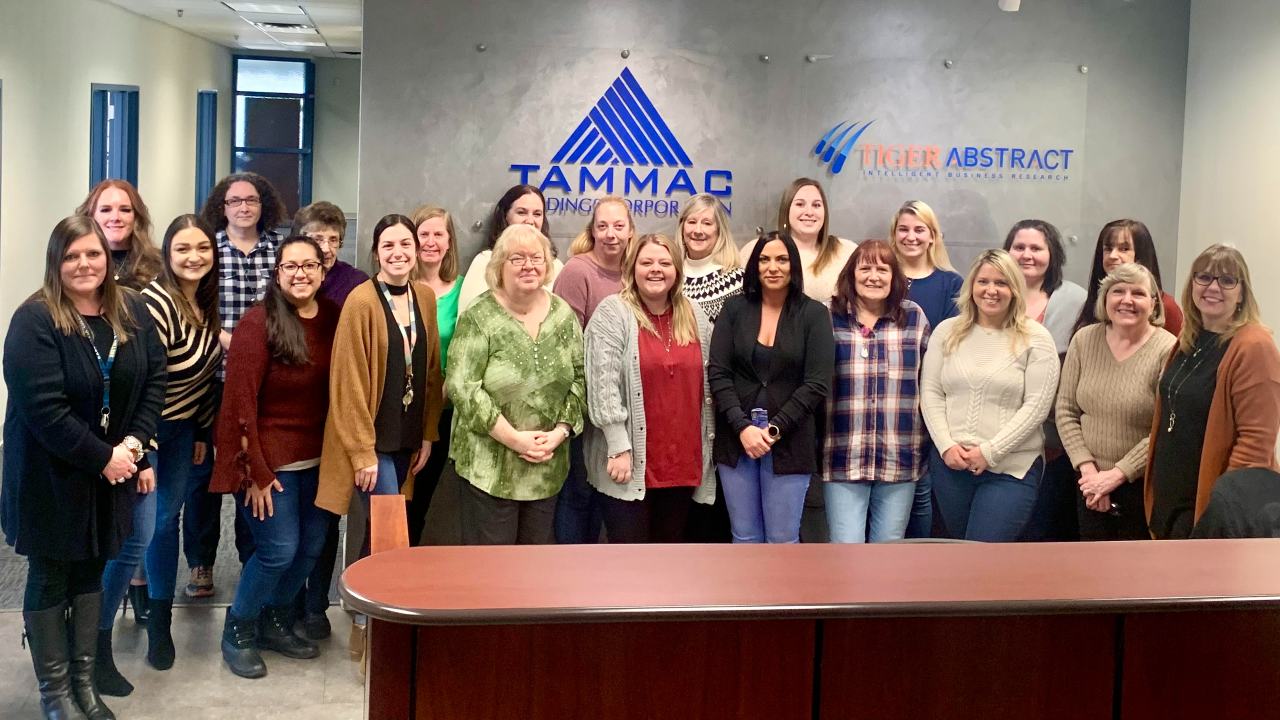 Group photo of Tammac's female employees for International Women's Day